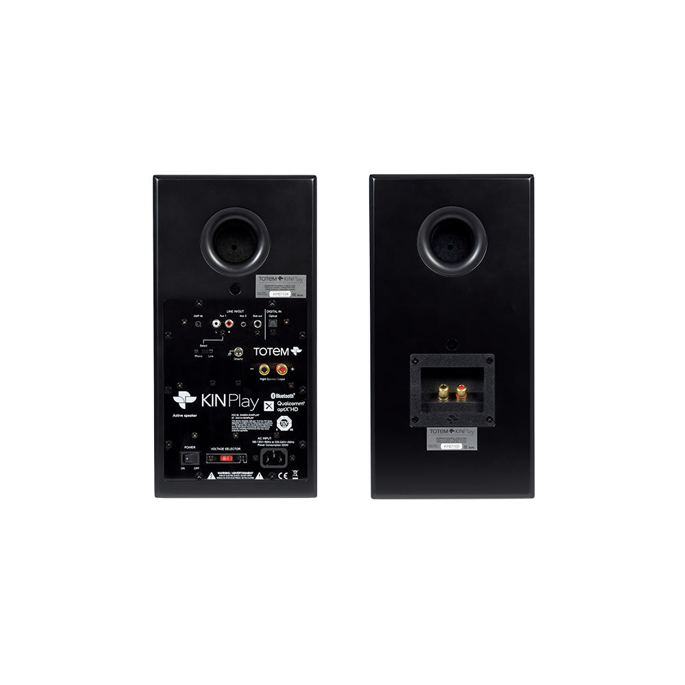 Backs of the black Kin Play pair: the active speaker's input panel with its optical, phono and AUX sockets beside the passive cabinet's bass port and terminals