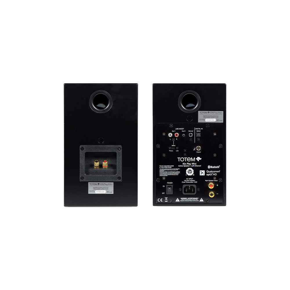 Backs of the black Kin Play Mini pair: the passive cabinet's terminals and bass port next to the active cabinet's input panel