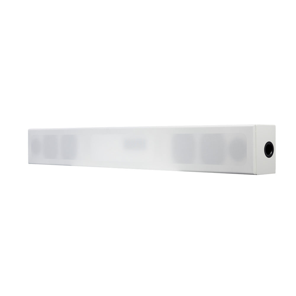 The white SoundBar II with its magnetic grille fitted, a plain cloth-covered bar over a metre wide