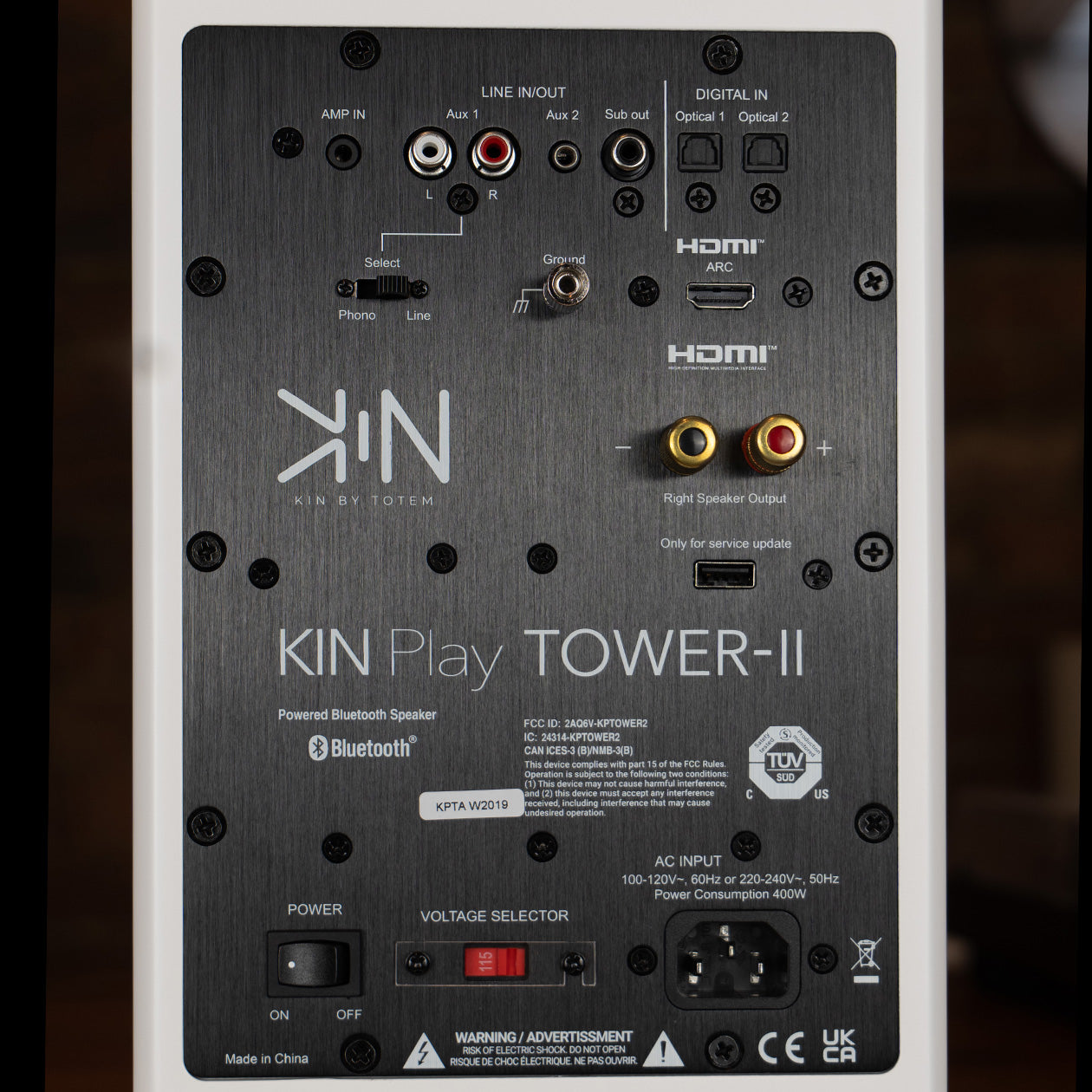 Close-up of the active Tower II's rear plate, marked KIN Play TOWER-II, with the HDMI ARC, optical, phono/line RCA, AMP IN and subwoofer sockets