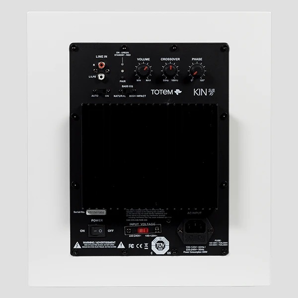 The white Kin Sub 10 from behind: the finned black amplifier plate with the level, crossover and phase dials, the BASS EQ switch and the RCA and LFE inputs